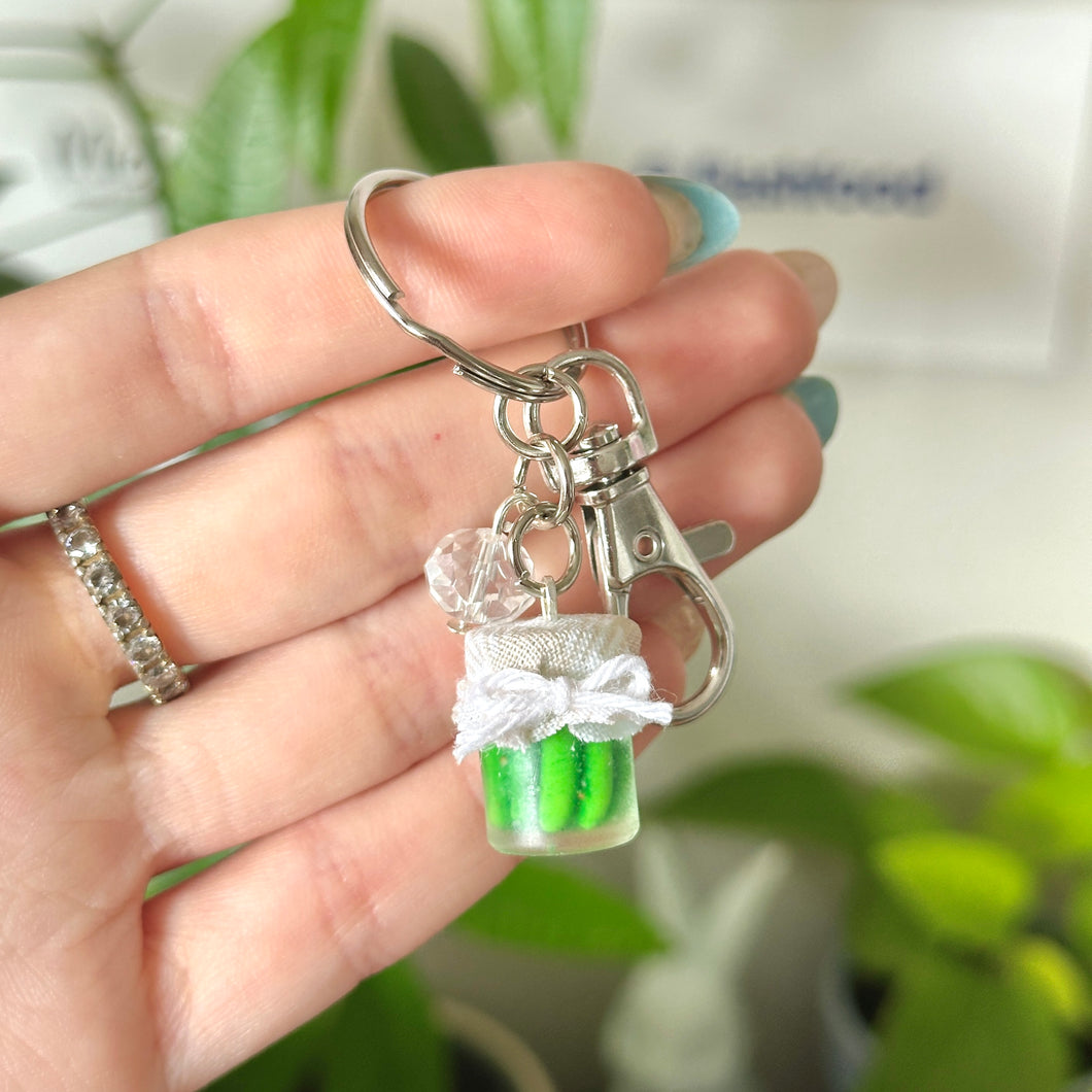 Pickle jar with bow keychain